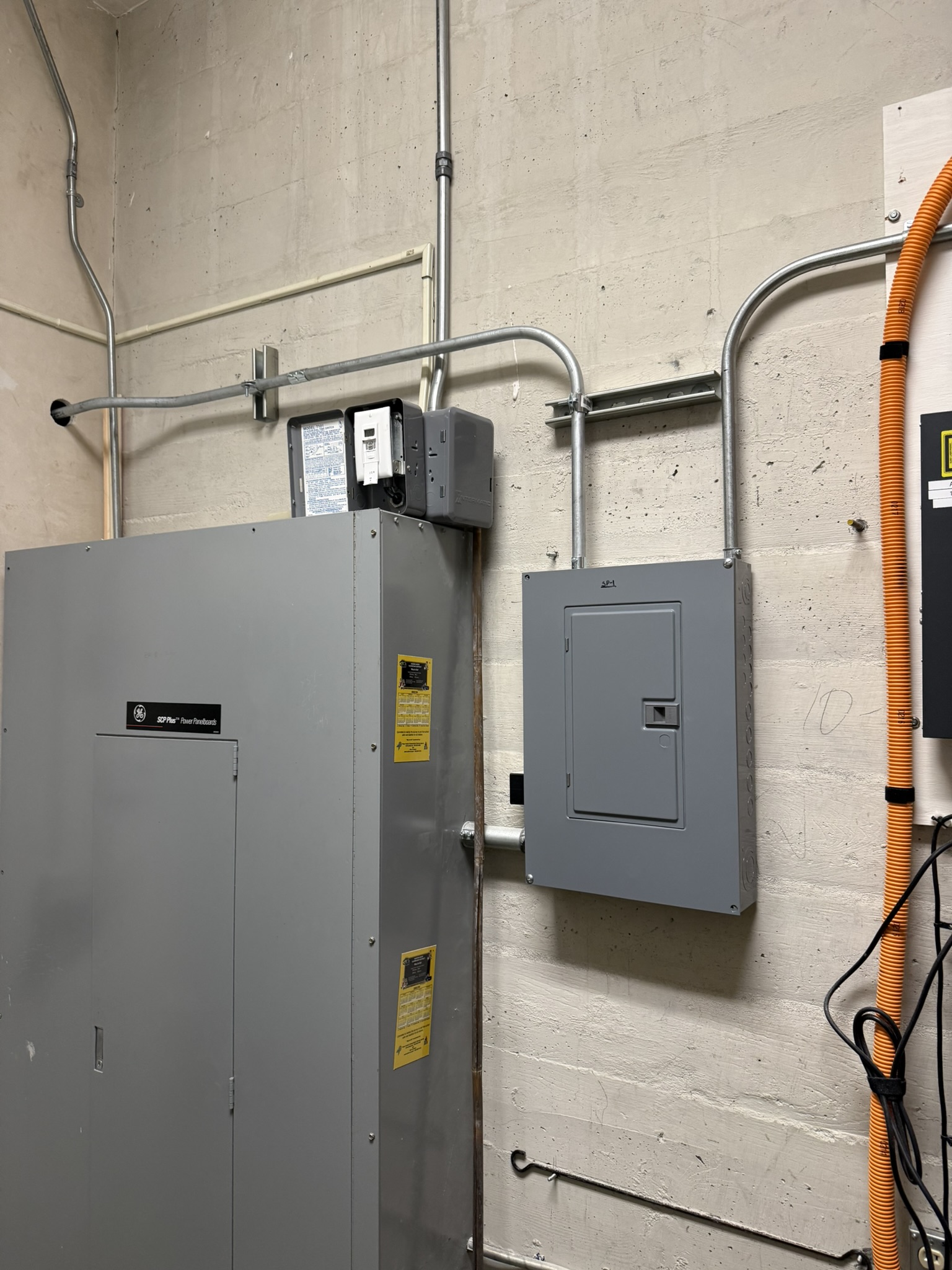Electrical panels and conduit at the Auburn commercial circuitry project